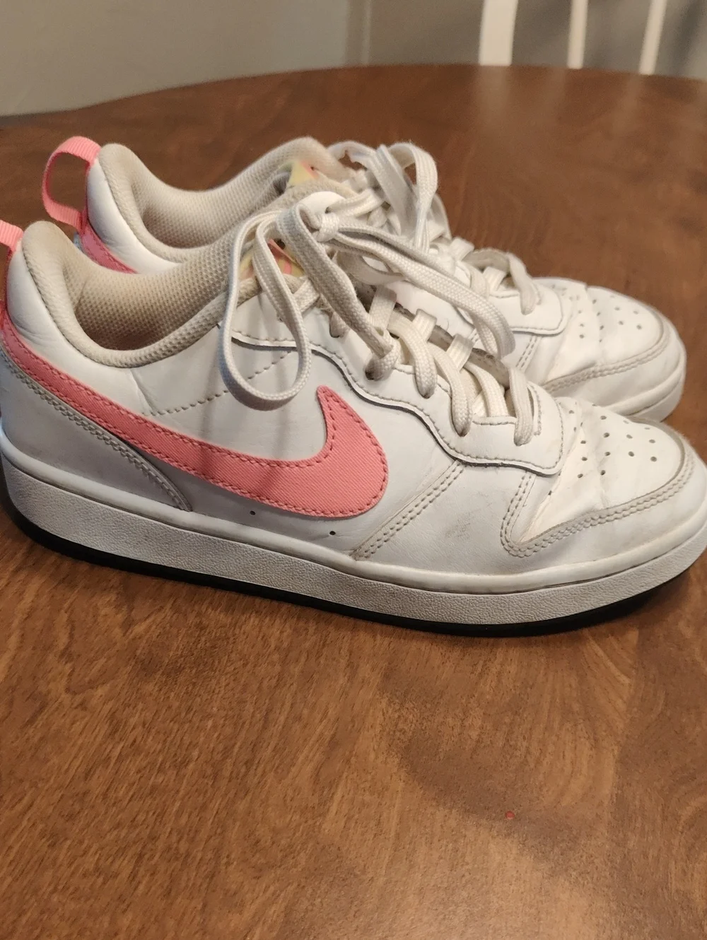 Nike White Low-Top Sneakers with Pink Swoosh